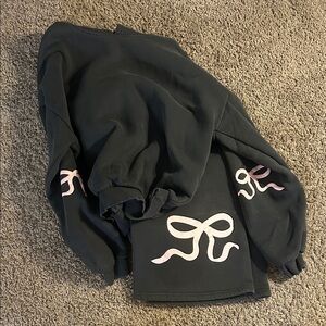 Edikted Black Sweatshirt with Pink Bow Design